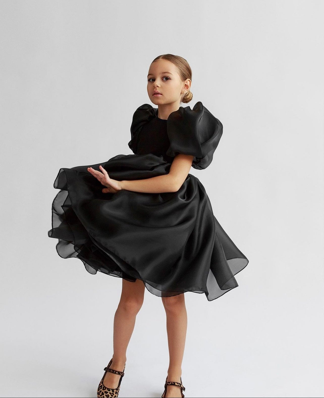 The Vintage Barbie. A special occasion dress with showstopper puffed sleeves in black.