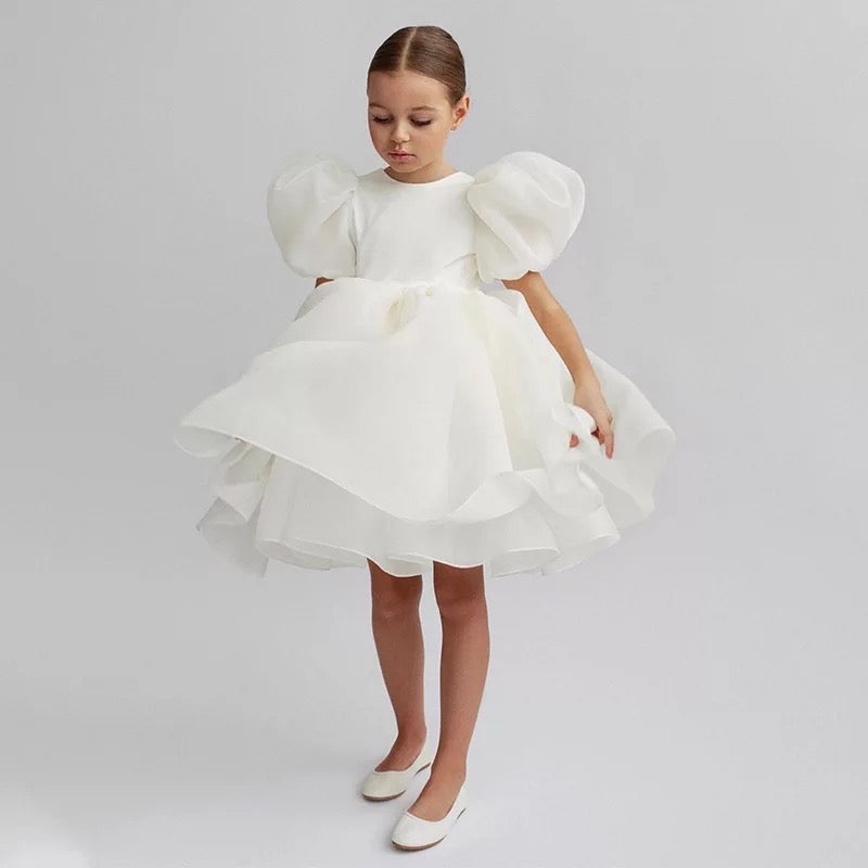 The Vintage Barbie. A special occasion dress with showstopper puffed sleeves in white. 