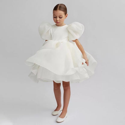 The Vintage Barbie. A special occasion dress with showstopper puffed sleeves in white. 